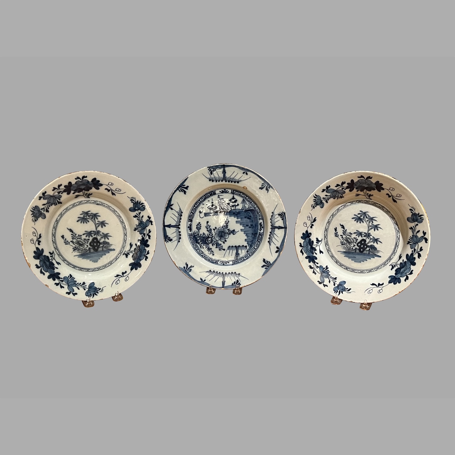 grouping-three-delft-blue-white-plates-a-pair-single-a425-1